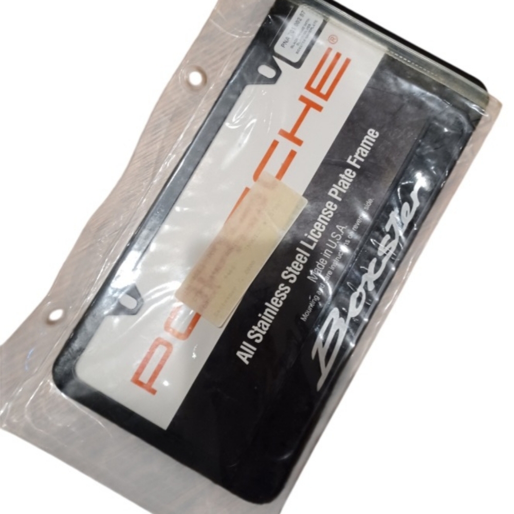 This is a genuine Porsche Boxster all stainless steel license plate frame